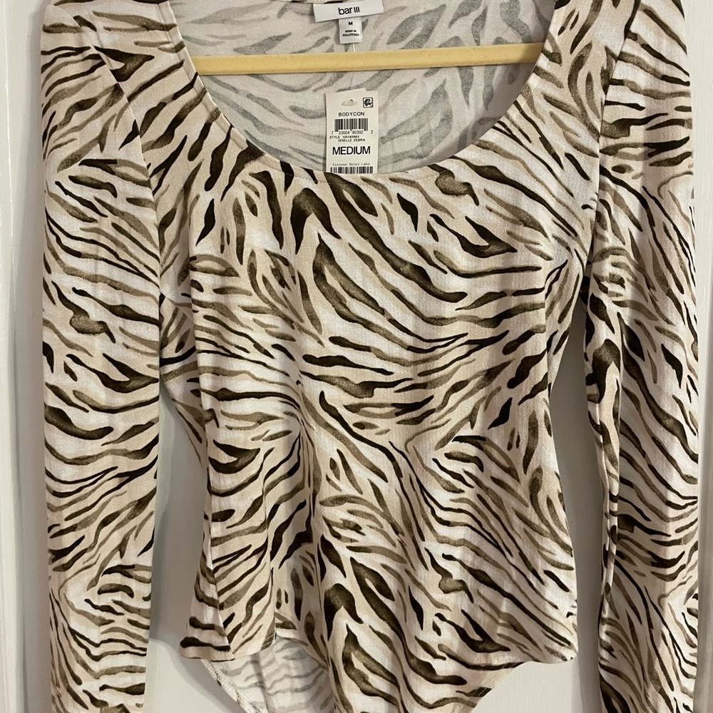 BRAND new leopard bodysuit. Size Medium.